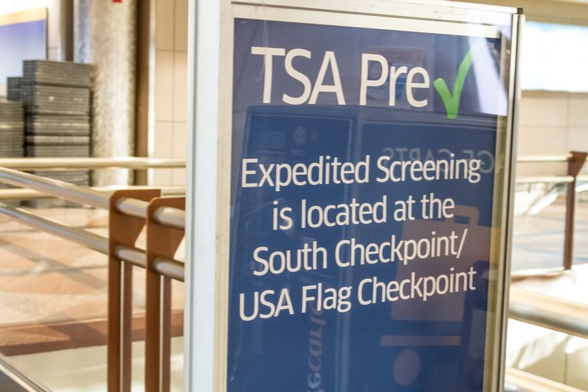 17403478 - tsa pre check in expedited screening sign at airport
